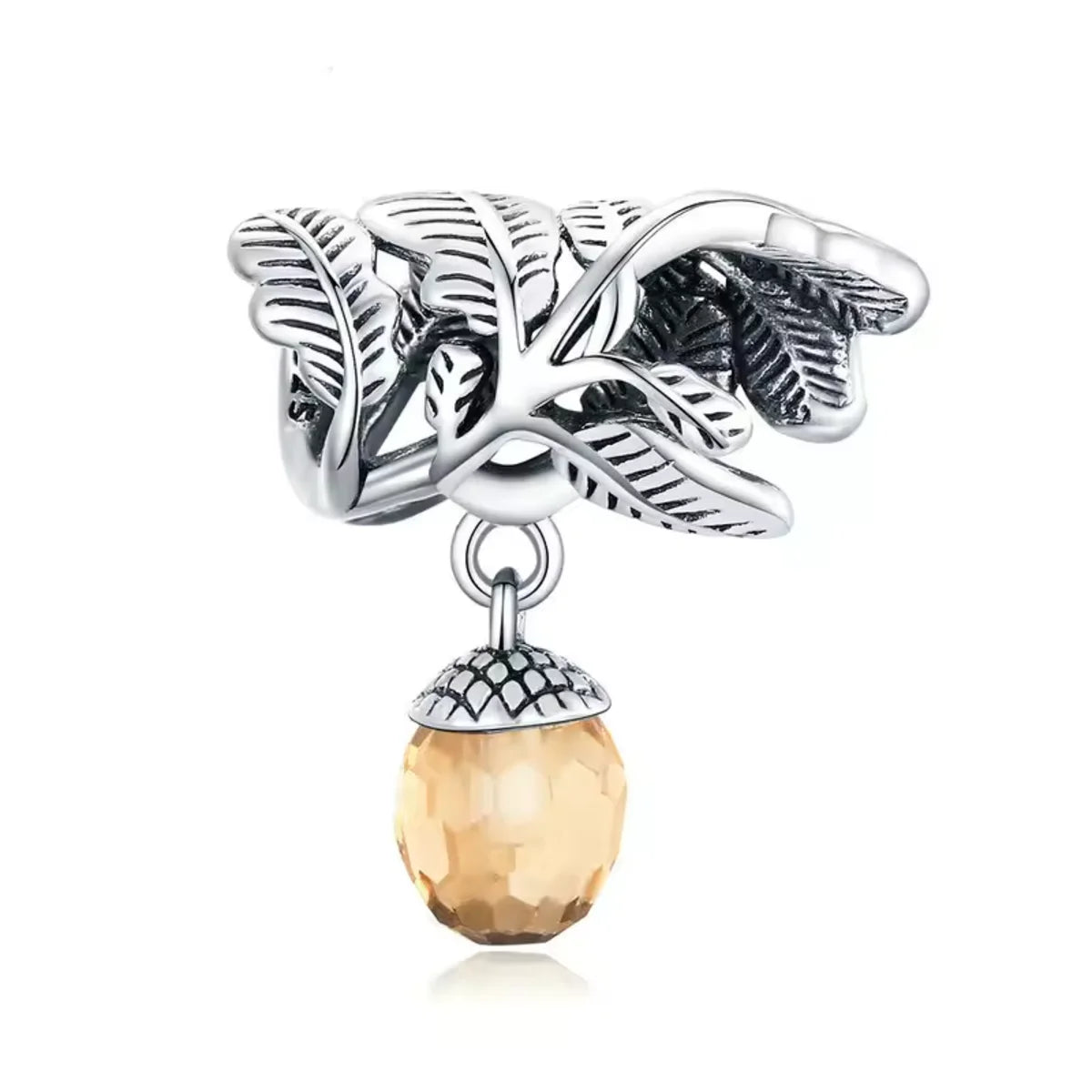 Showcase the beauty of nature with this intricate Acorn and Leaves Charm. Crafted from Sterling Silver, the charm highlights a detailed acorn surrounded by delicate leaf designs. Add this Pandora compatible charm to your collection and express your appreciation for the natural world.