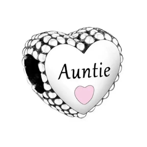 Show your aunt some love with this Sterling Silver Auntie Charm. This beautifully designed charm features a heart-shaped frame with &quot;Auntie&quot; written inside, along with a heart-shaped cutout that adds a touch of whimsy. Compatible with Pandora bracelets and other popular charm bracelets, this charm is a great way to show your favorite aunt how much you care.