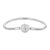 Silver bracelet with a decorative clasp on a white background