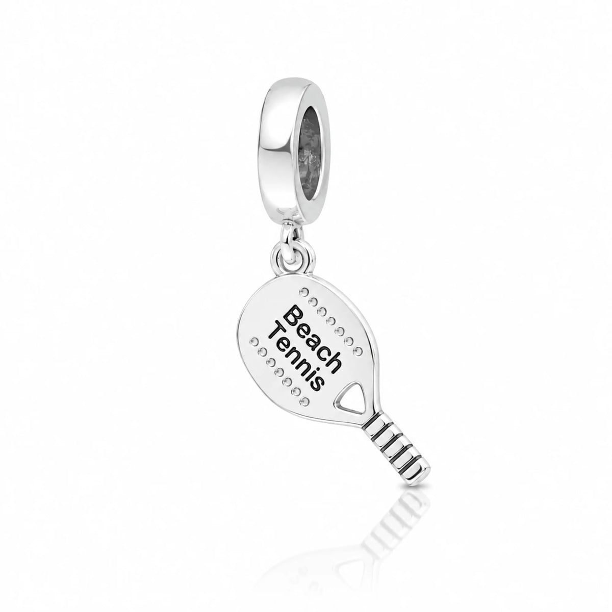 Silver charm shaped like a beach tennis racket on a white background