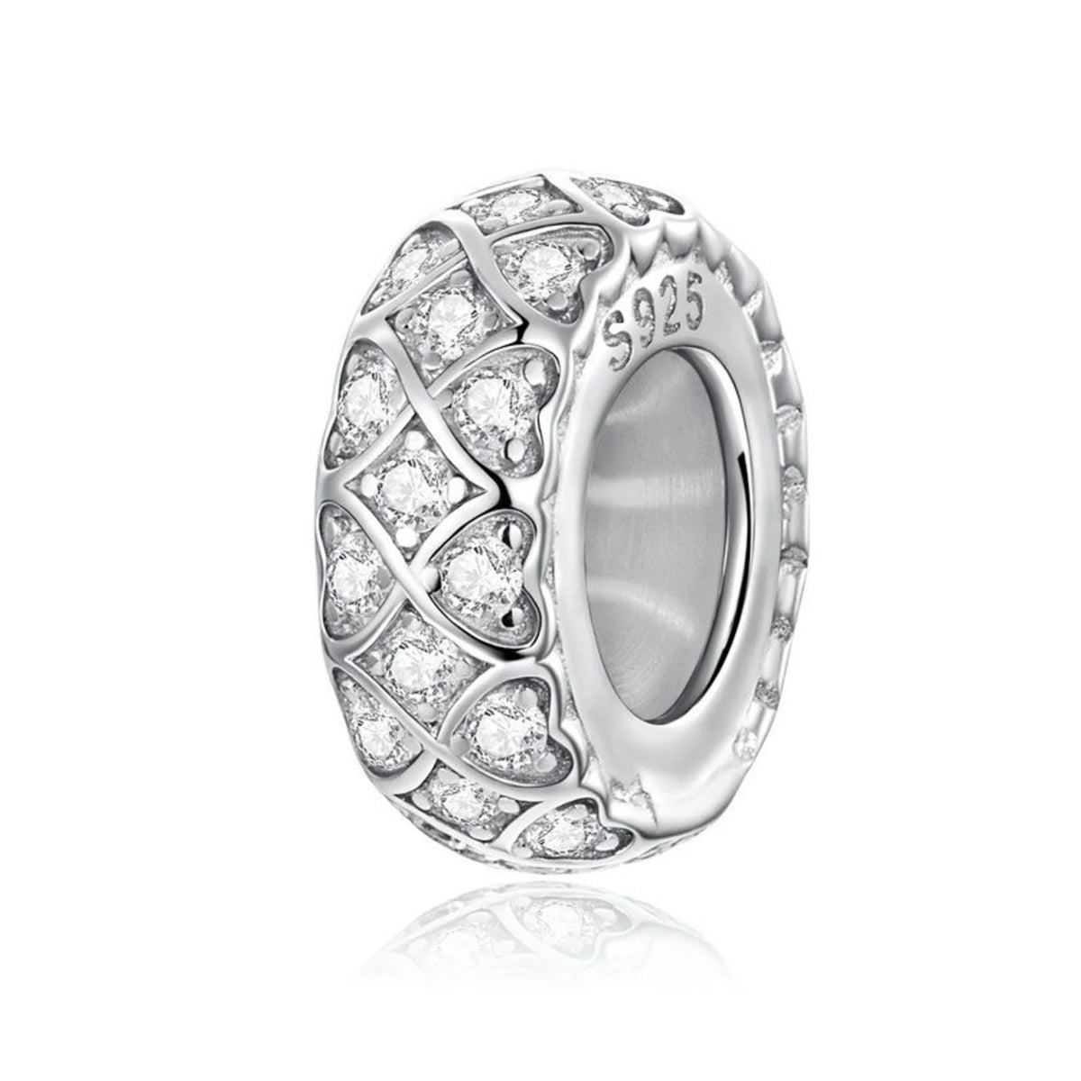 Silver charm with clear stones on a white background