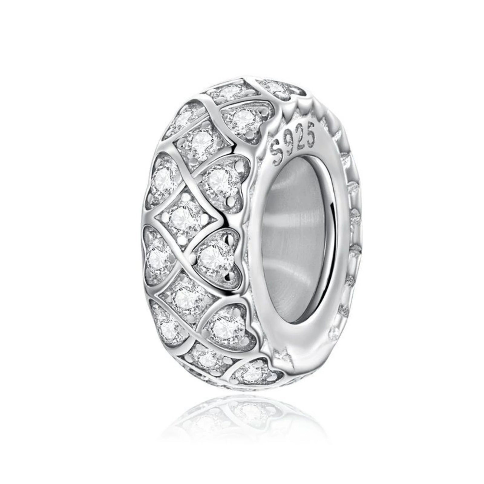 Silver charm with clear stones on a white background