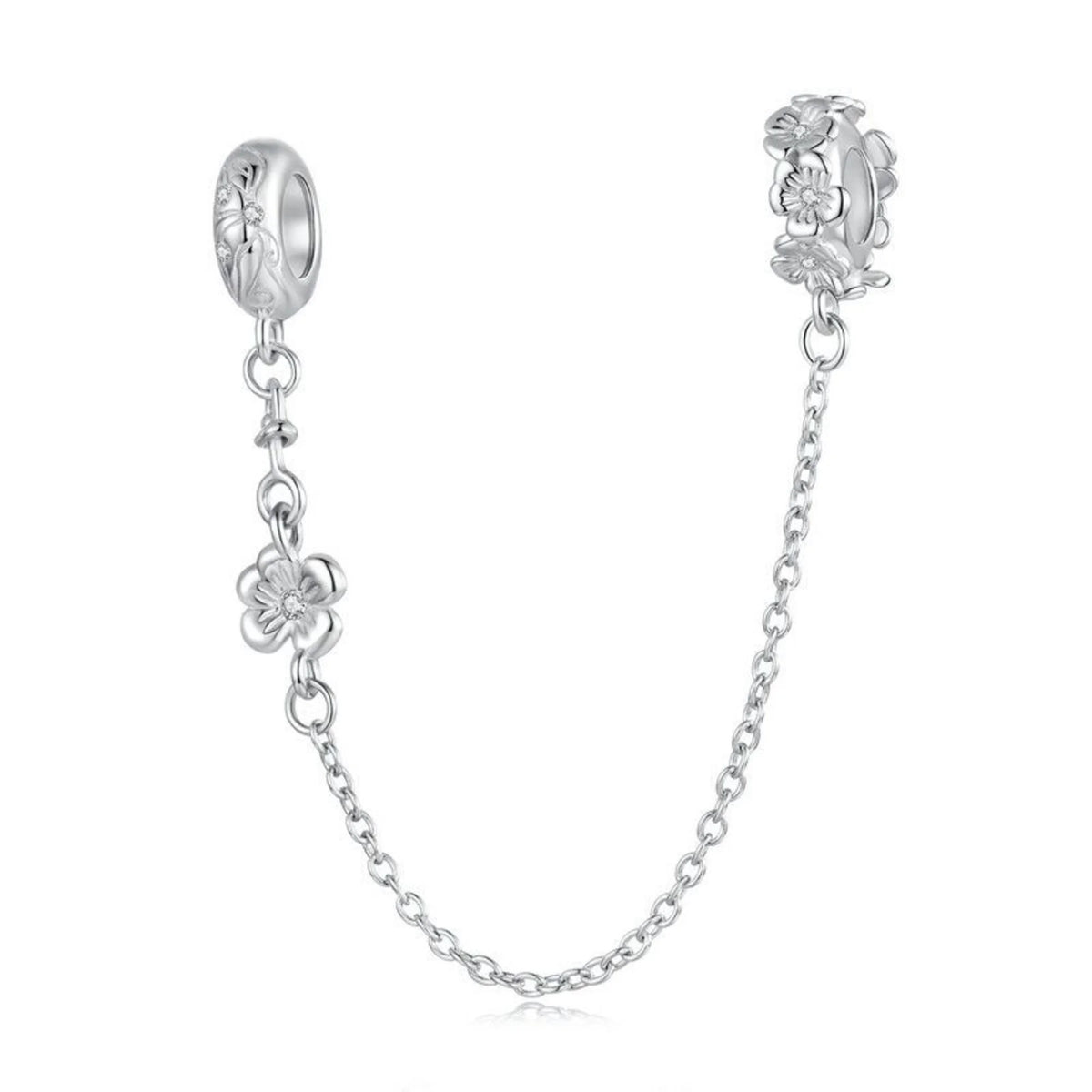 Silver charm with floral design and chain on a white background