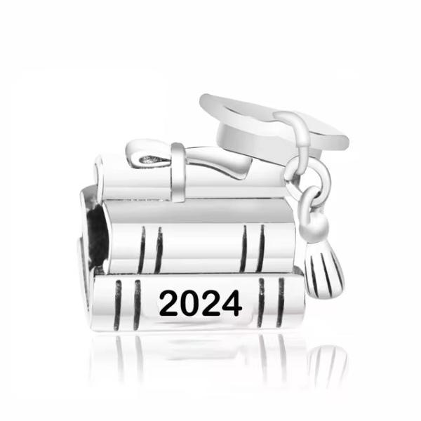 Commemorate your graduation with our Graduation 2024 Books Charm. Made from Sterling Silver and featuring a beautiful and detailed design with books, this charm is the perfect way to remember your academic achievements. With its intricate detailing and elegant design, this charm is sure to be a cherished addition to any graduate&#39;s bracelet.