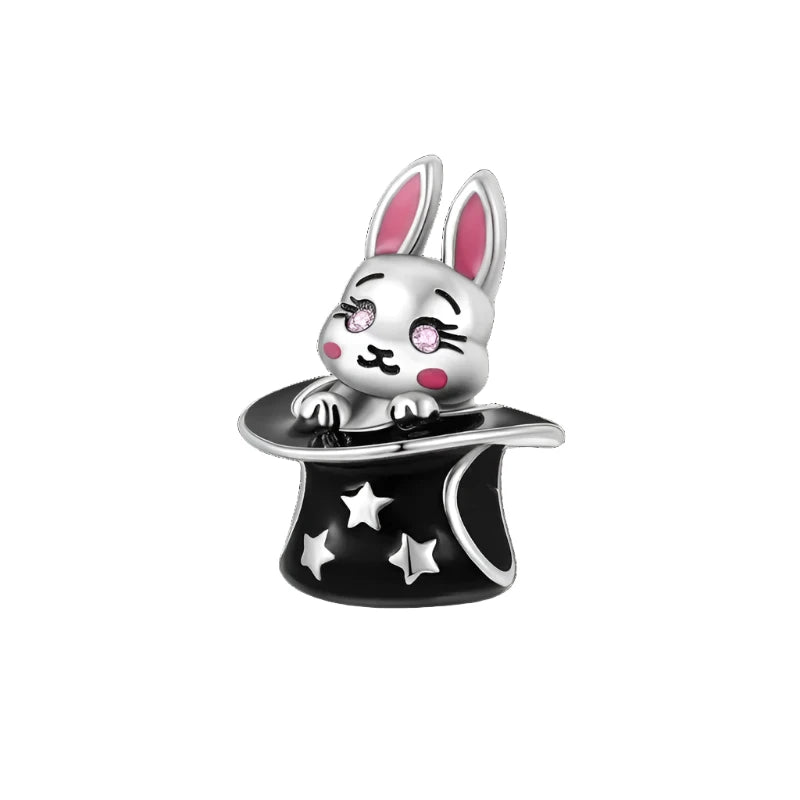 Hop into whimsical style with our adorable Bunny in a Hat Charm! Crafted with exquisite attention to detail, this charm features a delightful bunny peeking out from a charming hat. The vibrant enamel detailing adds a playful touch, while the sparkling cubic zirconia accentuates its charm.