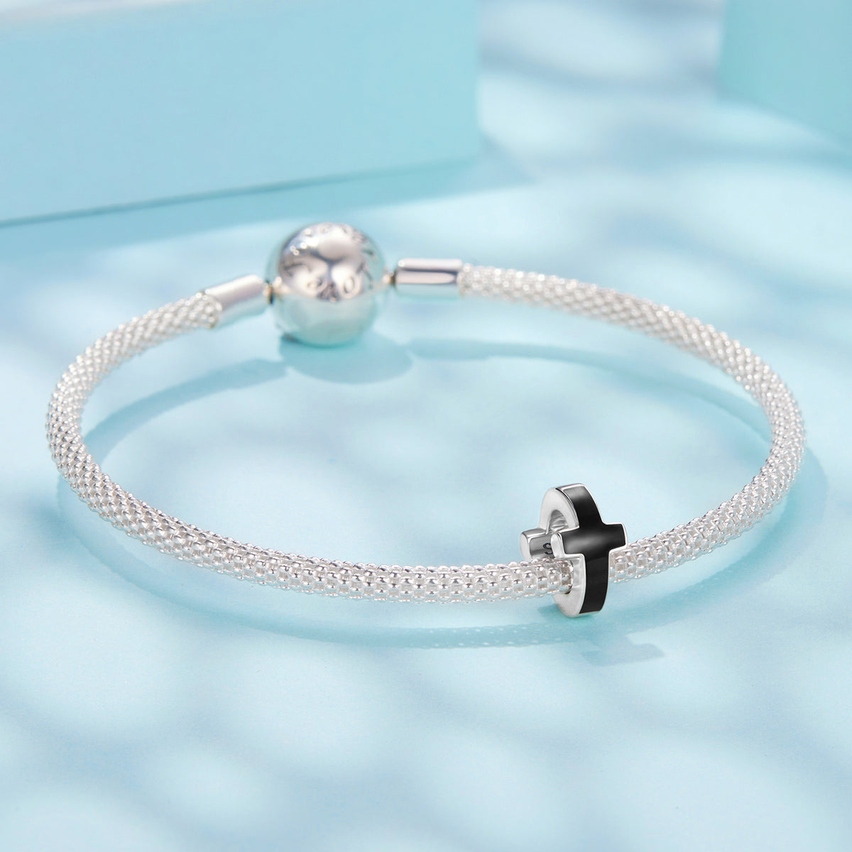 Beautiful Black Cross Spacer | EN