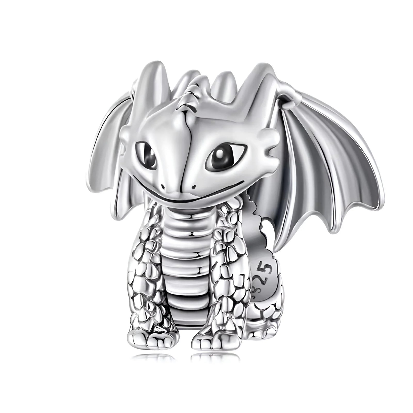 Silver dragon-shaped charm on a white background
