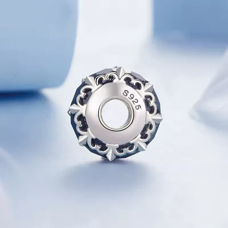S925 sterling silver charm with intricate floral design, showcasing elegance and beauty for bracelet embellishment.