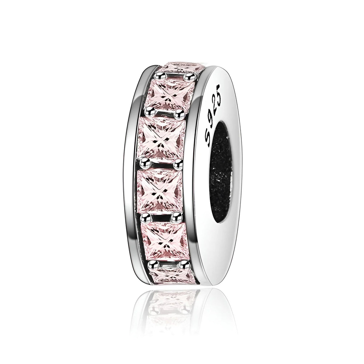 Silver charm with pink gemstones on a white background