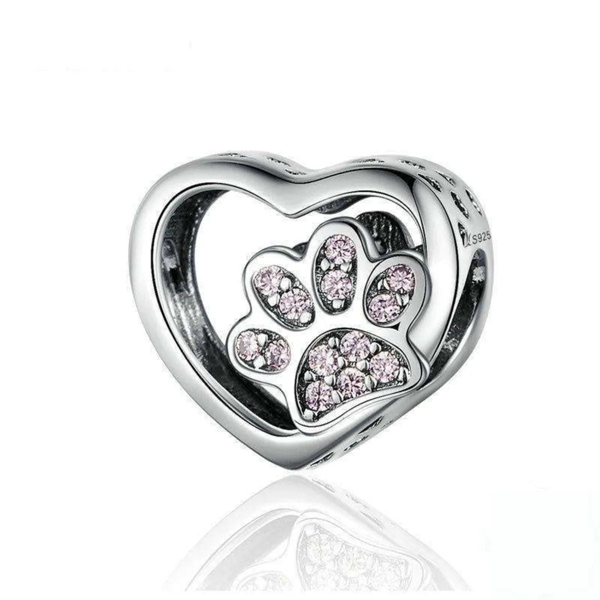 Heart-shaped charm with a paw print and pink cubic zirconia on a white background