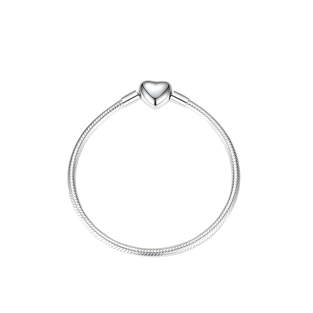 Express your love and style with this elegant Heart Clasp bracelet. Minimalistic yet chic, this bracelet is crafted from high-quality sterling silver, with a sleek heart-shaped clasp that symbolizes love and connection. It’s the perfect foundation for building a personalized charm collection