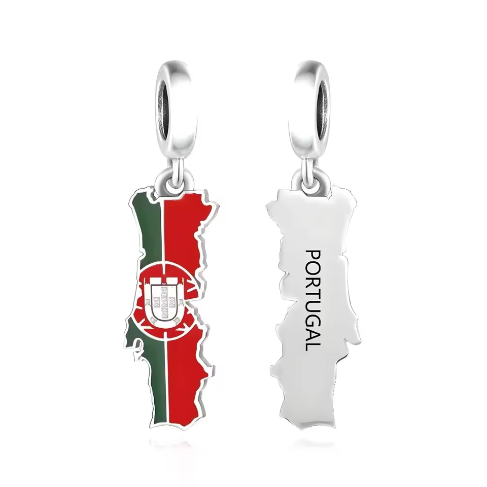 Celebrate your Portuguese pride or your unforgettable travels with this vibrant Portugal flag dangle charm! Designed in the shape of the country and filled with the national colors in rich enamel, this charm features the detailed Portuguese coat of arms at the center, a powerful symbol of history and culture.