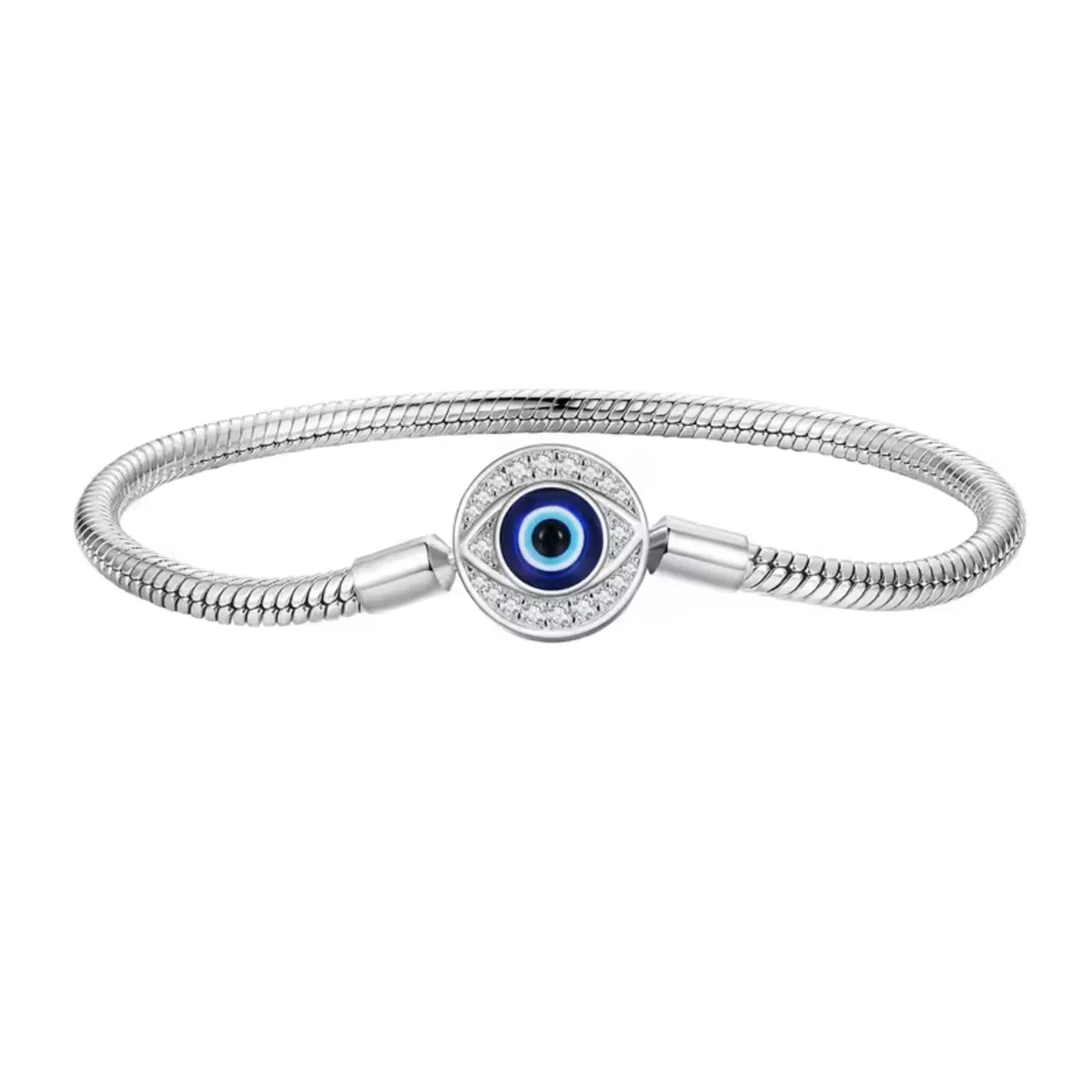 Silver bracelet with a blue evil eye charm on a white background
