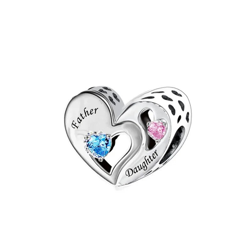 Father and Daughter heart charm with blue and pink CZ stones representing the special bond between dads and their daughters.