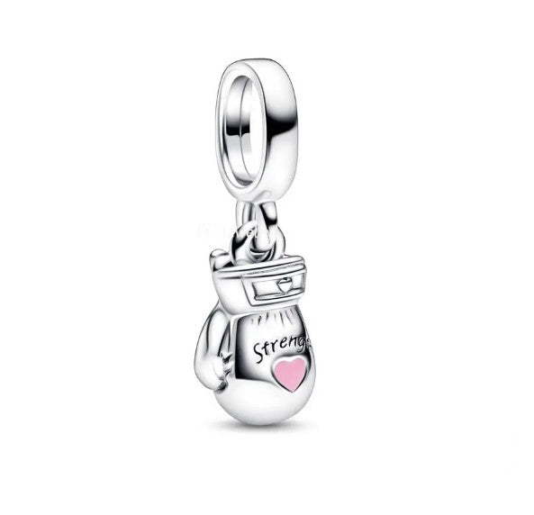 A silver-colored boxing glove dangle charm with the word 'STRENGTH' engraved on it and a heart shape at the bottom.