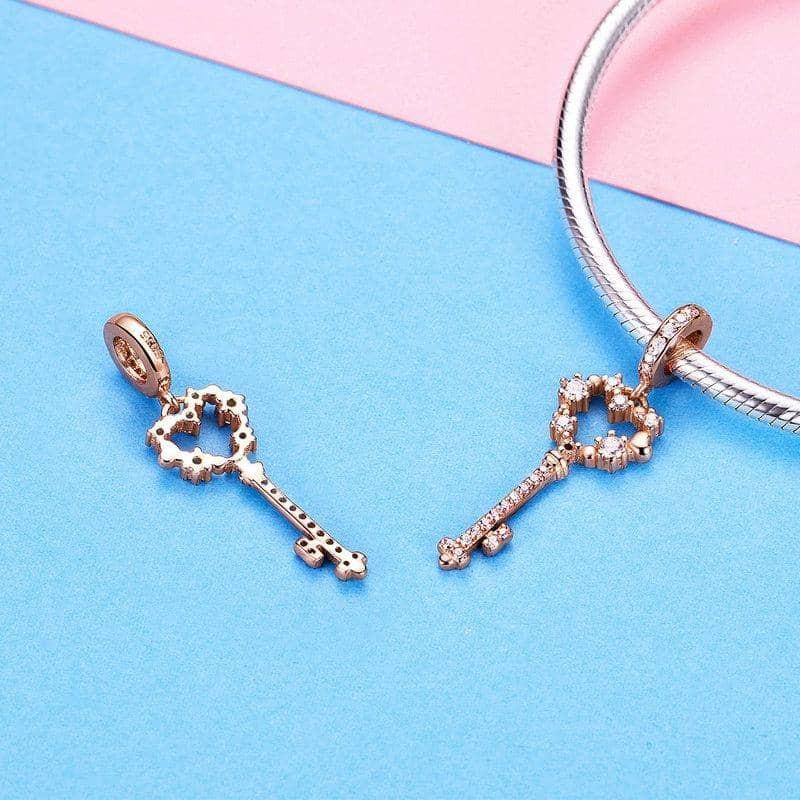 Celebrate your 21st birthday with this Sterling Silver 21st Key Dangle Charm. The intricate design and sparkling cubic zirconia stones make it a beautiful addition to any charm bracelet.