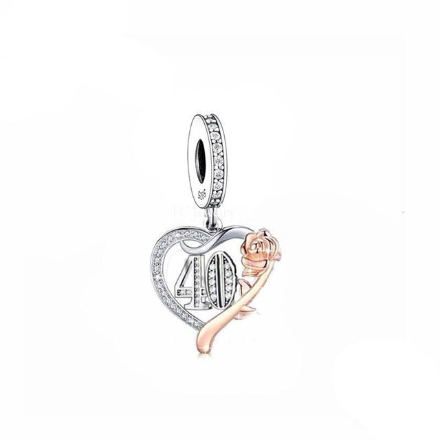 Sterling silver birthday number 40 dangle charm with cubic zirconia detailing, fits Pandora and Trollbeads bracelets.