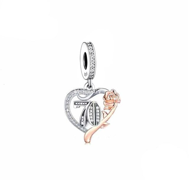 Sterling silver birthday number dangle charm with cubic zirconia and rose gold accents, fits Pandora and Trollbeads bracelets.