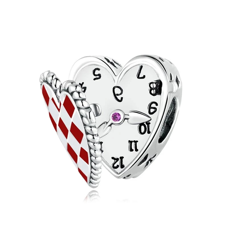 This Sterling Silver Alice In Wonderland Clock Charm is a quirky addition to any charm collection. Featuring a detailed clock design with an upside-down face, this charm is a fun way to show off your unique style. Compatible with Pandora bracelets and other popular charm bracelets, this charm is perfect for anyone who loves a touch of whimsy.