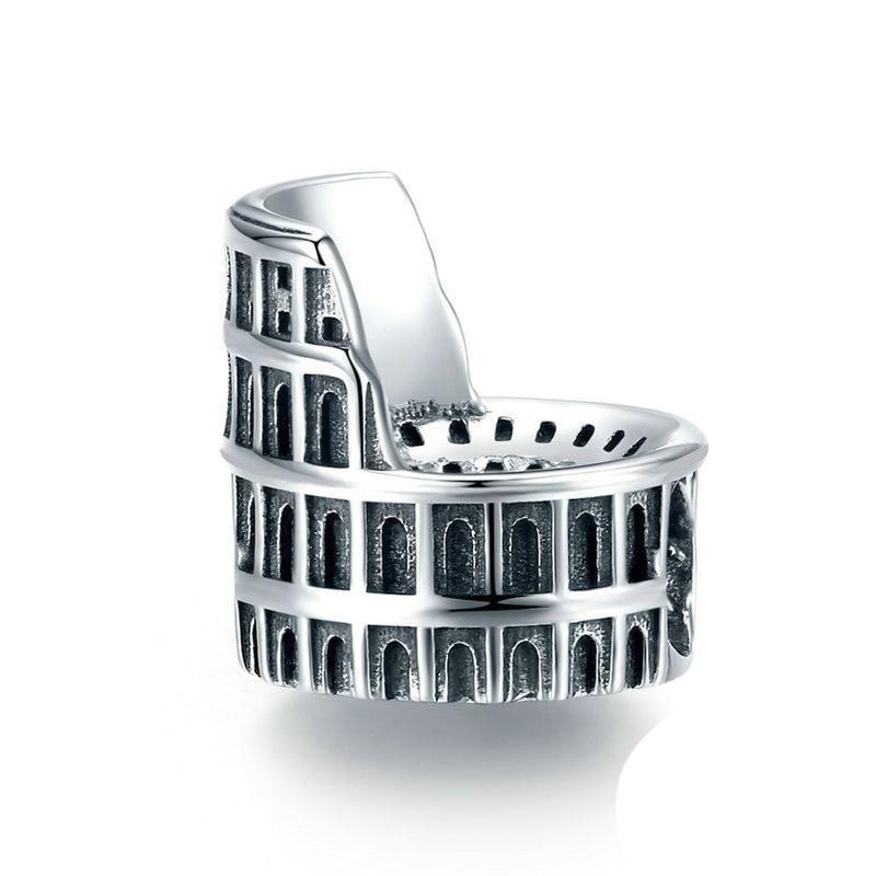A silver charm in the shape of the Colosseum with intricate details, compatible with Pandora charm bracelets.