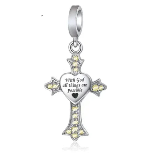 The Cross with God Faith Dangle Charm is a beautiful and meaningful addition to any charm collection. Featuring a beautifully detailed dangle charm with a cross and the words &quot;God&quot; and &quot;Faith&quot; design, this charm is perfect for anyone who loves a touch of spirituality and believes in the power of faith. Compatible with Pandora bracelets and other popular charm bracelets, this cross with God faith dangle charm is a stunning addition to any collection.