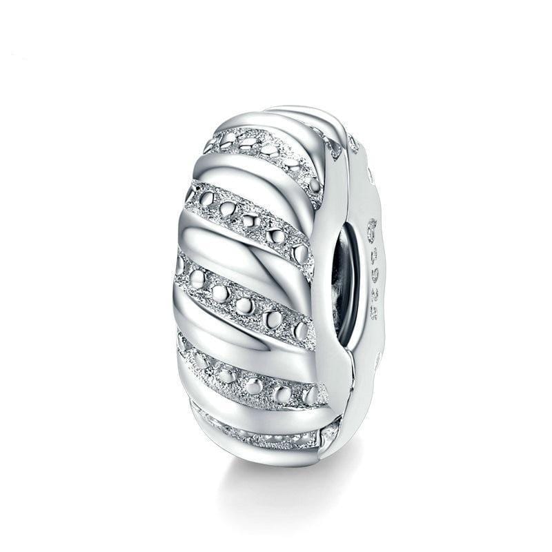 Add some subtle elegance to your Pandora bracelet with our Minimalist Dot Spacer. Made from Sterling Silver and featuring a beautiful design, this charm is the perfect way to add some sophistication to your collection. With its simple style and understated beauty, this charm is sure to be a favorite.