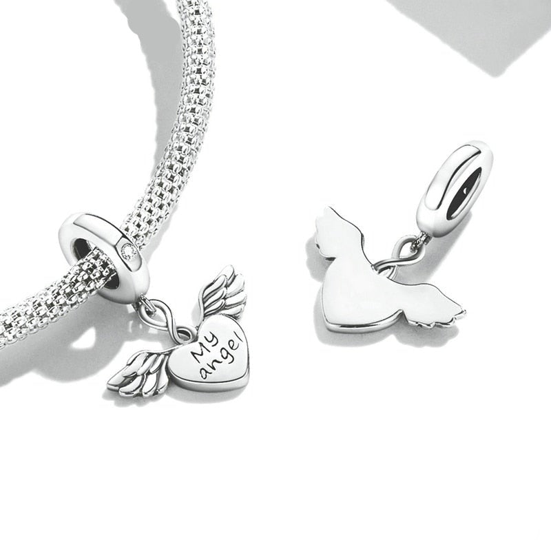 Keep your guardian angel close with our Petite My Angel Charm. Made from high-quality Sterling Silver and featuring a beautiful design, this charm is the perfect way to show your faith and belief in angels. With its intricate details and heartfelt message, this charm is sure to be treasured for years to come.