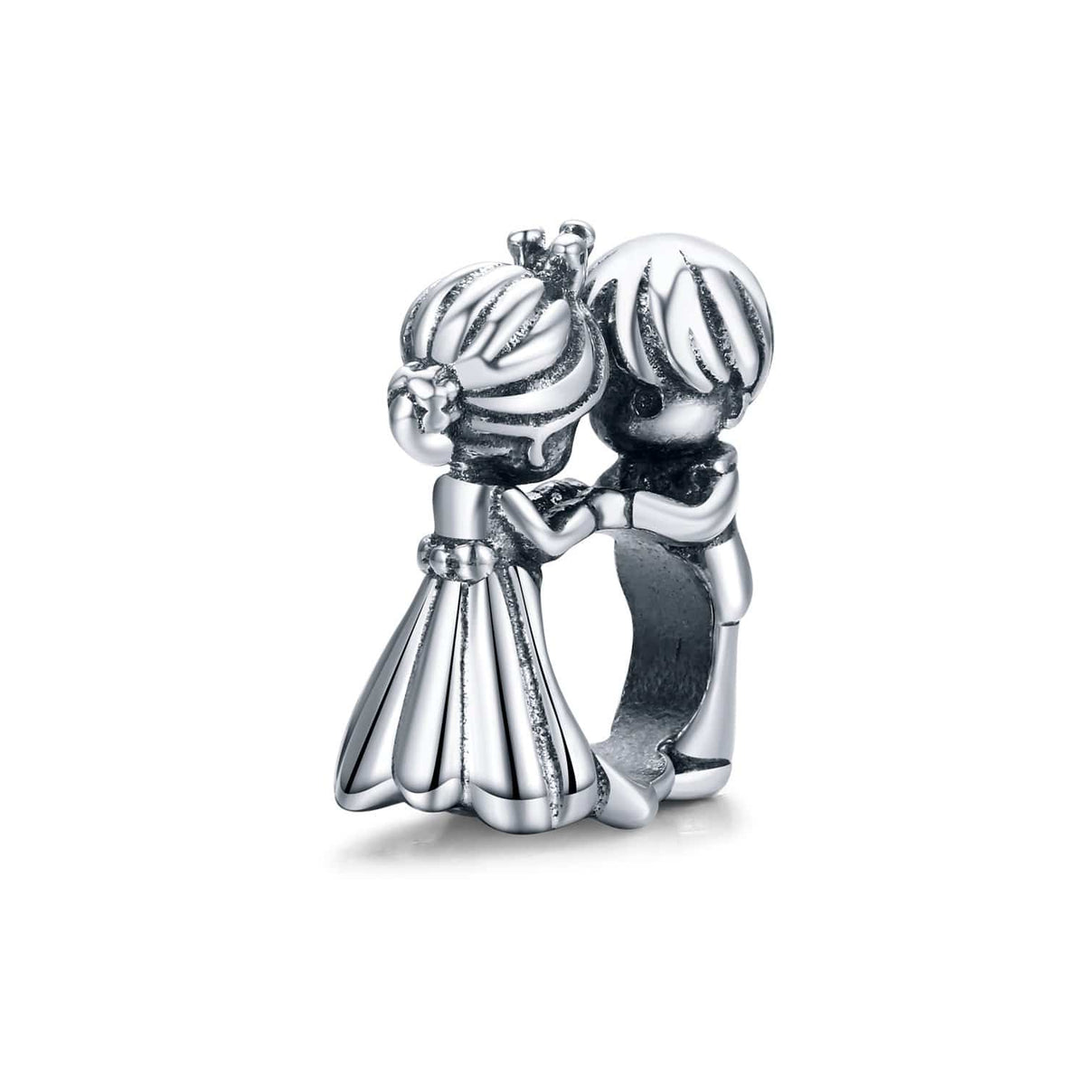 A sterling silver charm in the shape of a bride and groom dancing, with the bride wearing a white dress and the groom in a suit.
