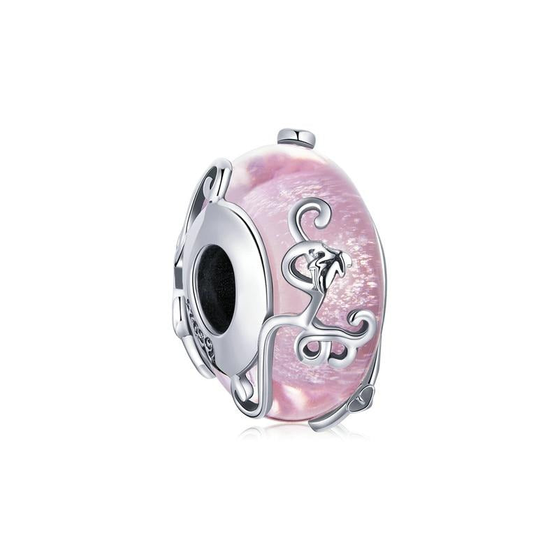 A Vined Pink European Murano Glass Charm made of sterling silver with a vibrant pink glass design and intricate detailing.