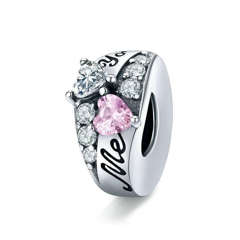 A Sterling Silver ring with a heart-shaped design and cubic zirconia embellishments